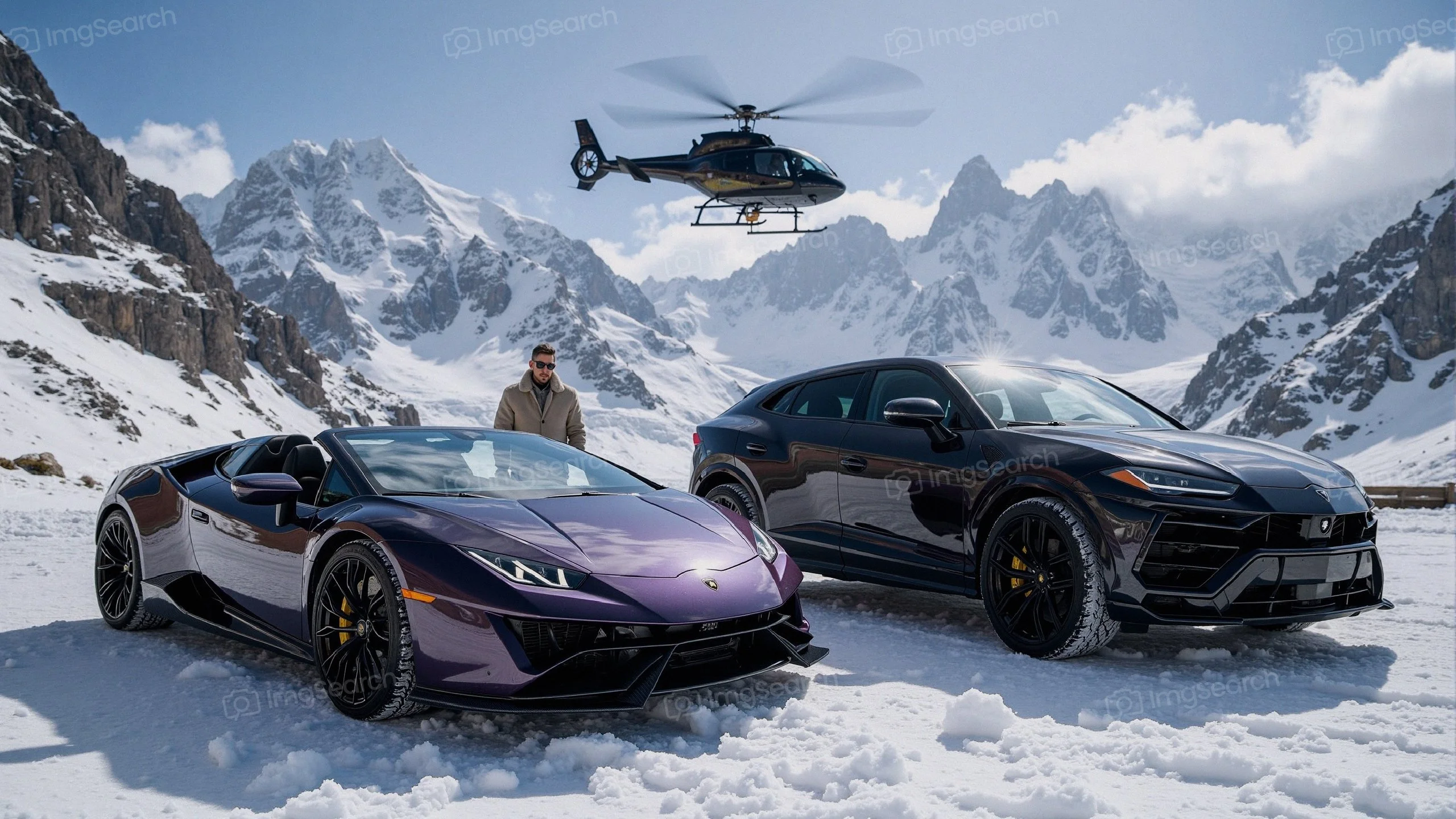 A purple Lamborghini Huracán a black Lamborghini Urus on snow with mountains a helicopter in the background.