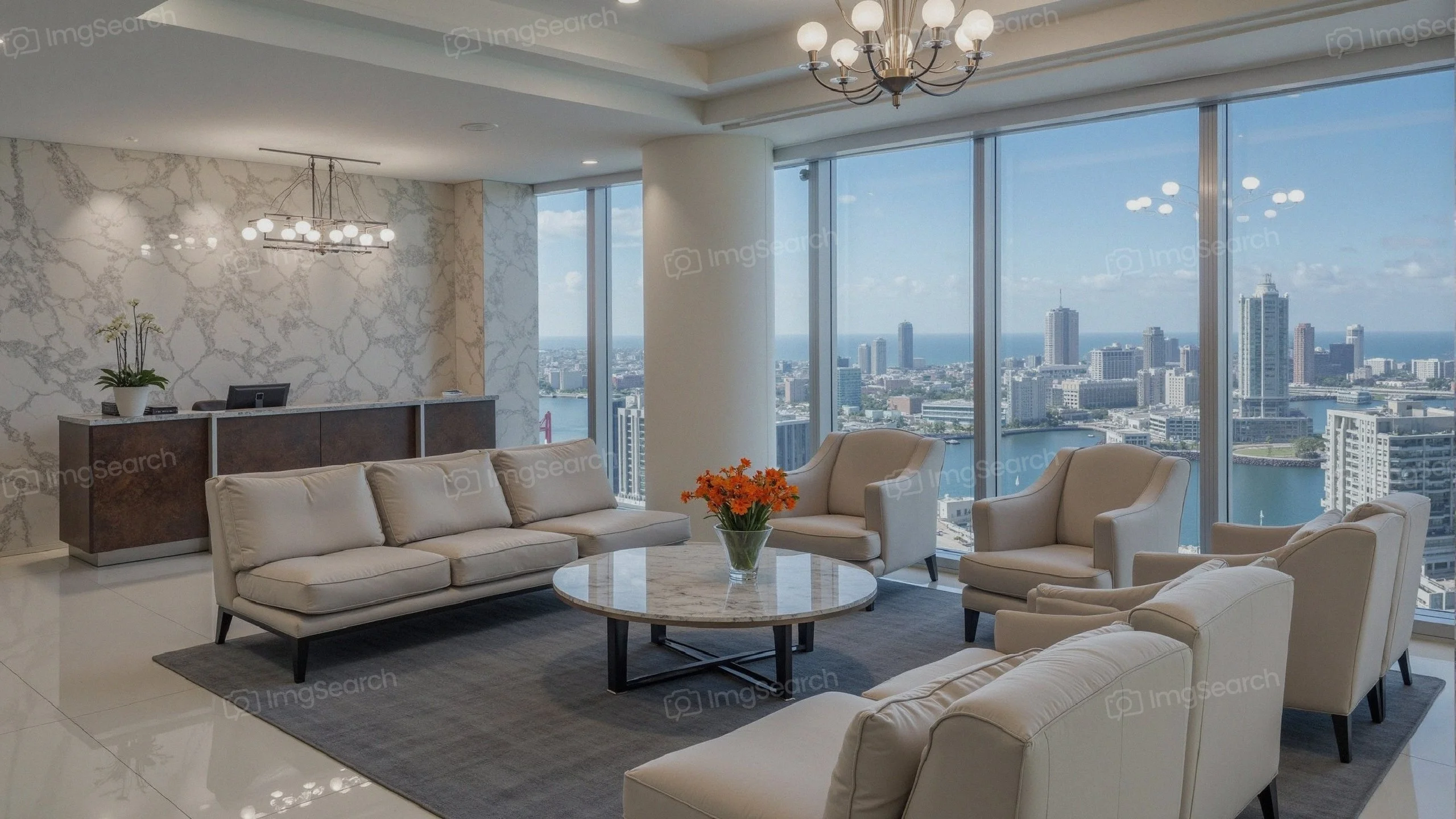 A modern lobby of a high-rise building featuring white sofas, a round coffee table, a panoramic view of the city skyline.
