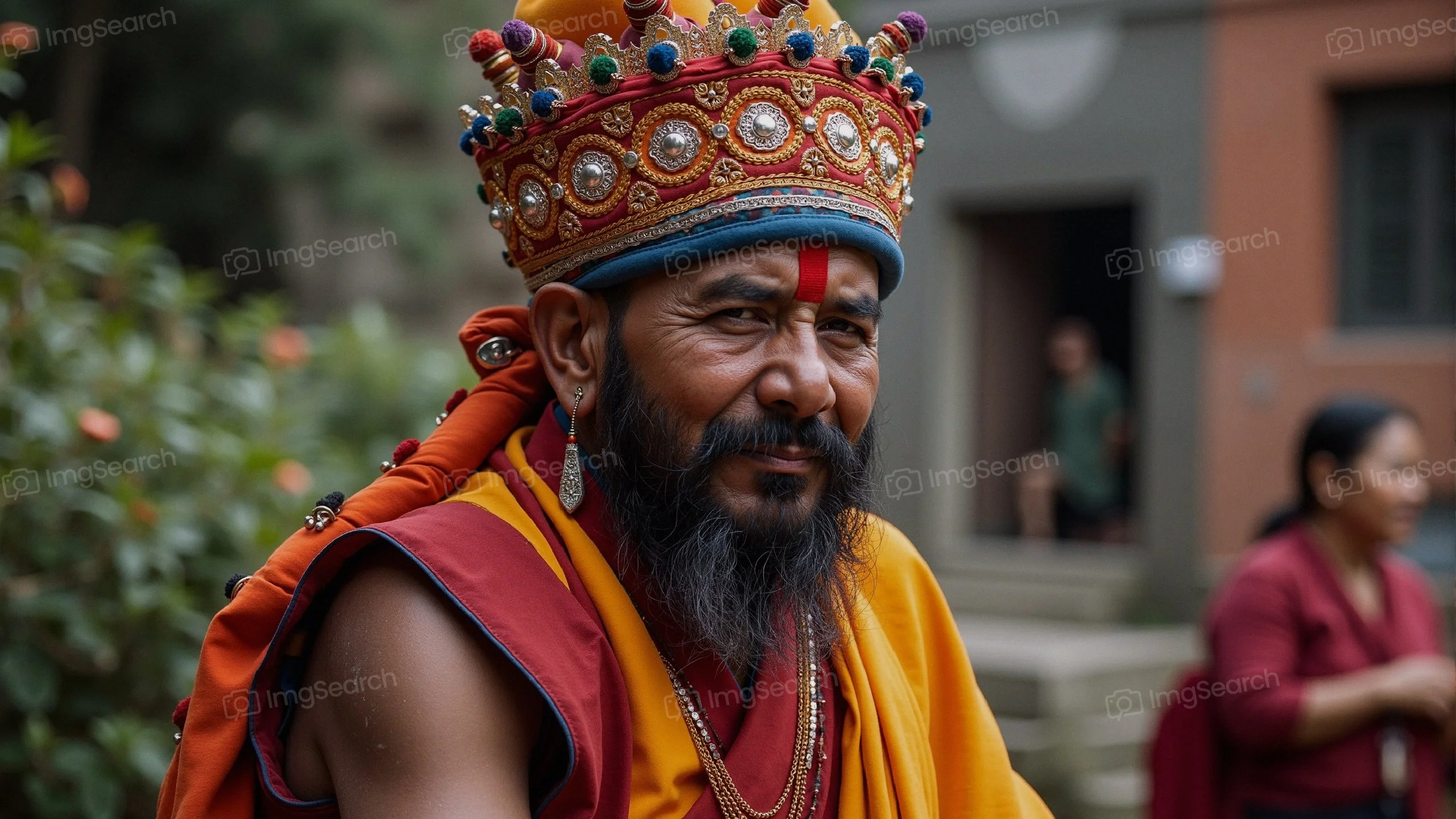 A spiritual leader wearing a colorful crown traditional clothing, showcasing a expression.