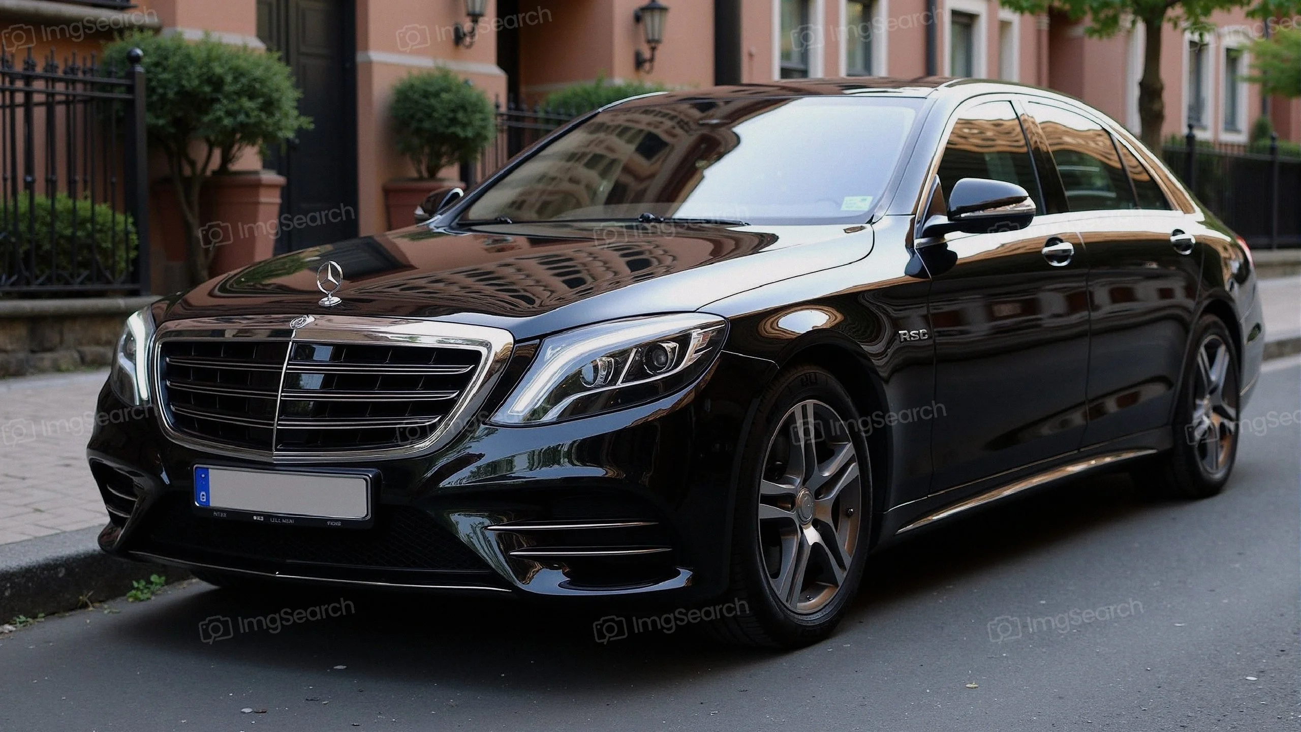 Black Mercedes-Benz S-Class parked on a street