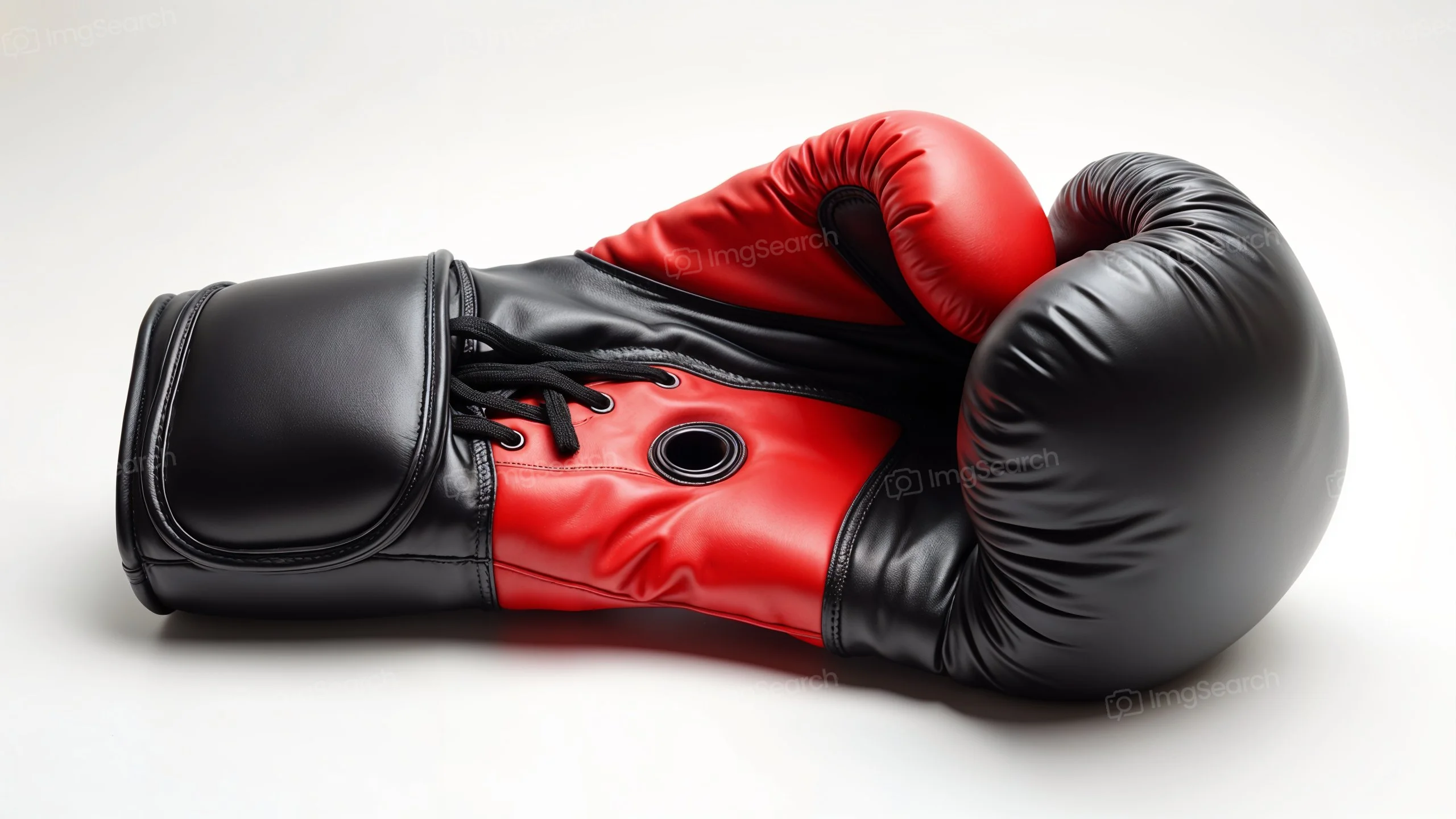 Close-up of a red and black boxing glove