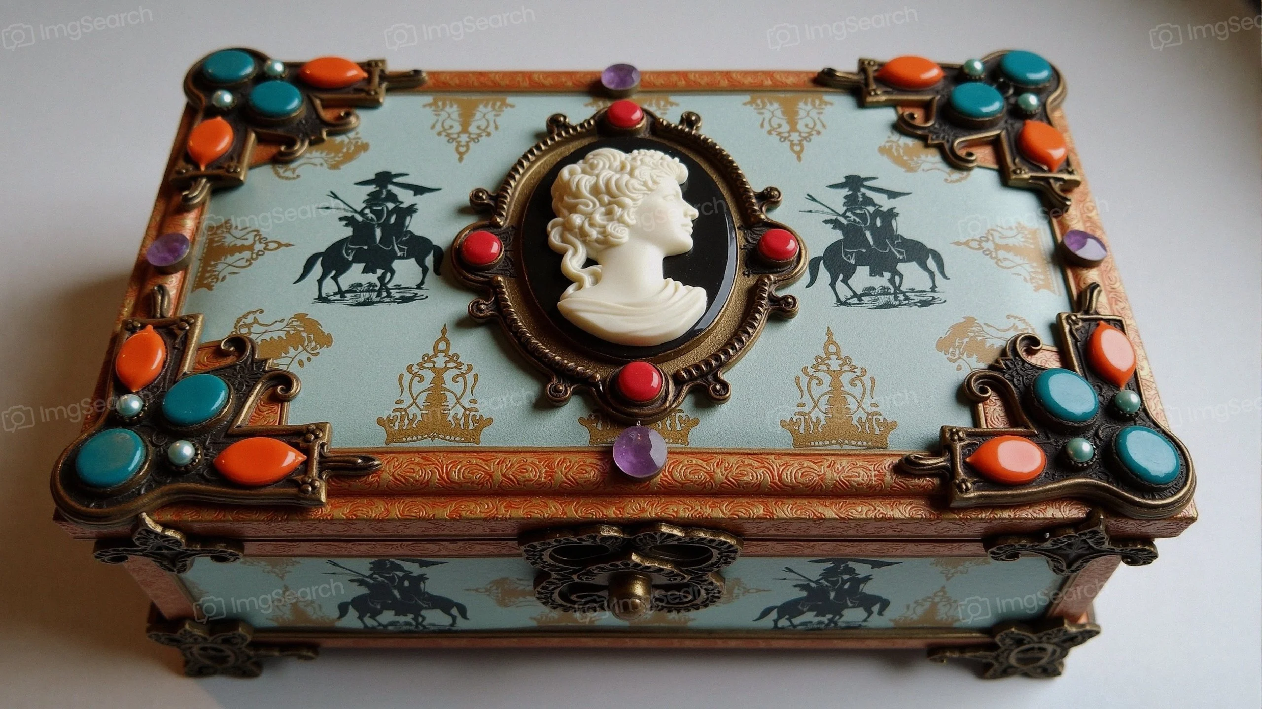 Vintage jewelry box with a cameo colorful gemstones